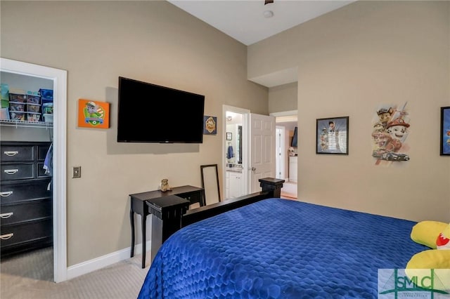 bedroom featuring light colored carpet