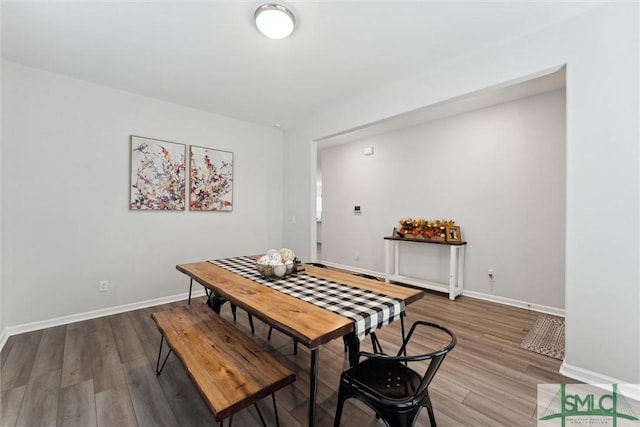 dining room featuring hardwood / wood-style flooring