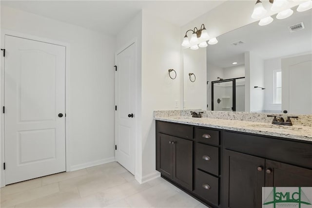 106 Liam Ct, Guyton, GA 31312 - bathroom featuring a shower stall, double vanity, and baseboards