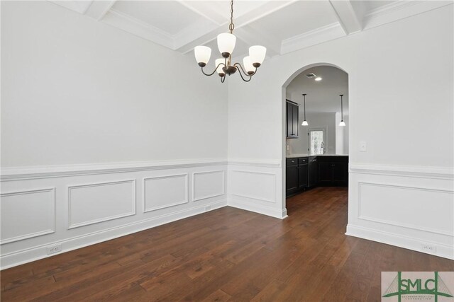 106 Liam Ct, Guyton, GA 31312 - unfurnished dining area featuring a chandelier, dark wood-style floors, beamed ceiling, arched walkways, and coffered ceiling