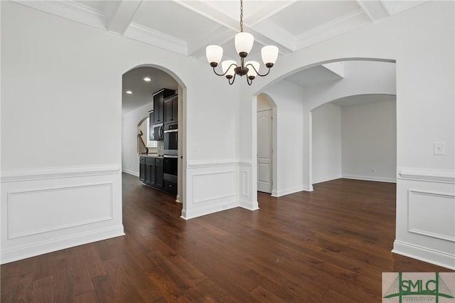 106 Liam Ct, Guyton, GA 31312 - unfurnished dining area with a chandelier, coffered ceiling, dark wood-type flooring, beamed ceiling, and wainscoting