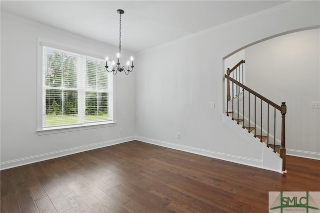 106 Liam Ct, Guyton, GA 31312 - empty room featuring healthy amount of natural light, crown molding, dark wood-type flooring, a chandelier, and stairway