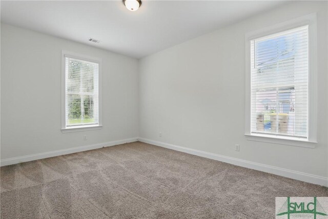 106 Liam Ct, Guyton, GA 31312 - carpeted spare room featuring baseboards