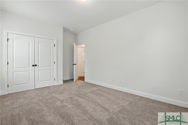 106 Liam Ct, Guyton, GA 31312 - unfurnished bedroom with carpet, baseboards, and a closet