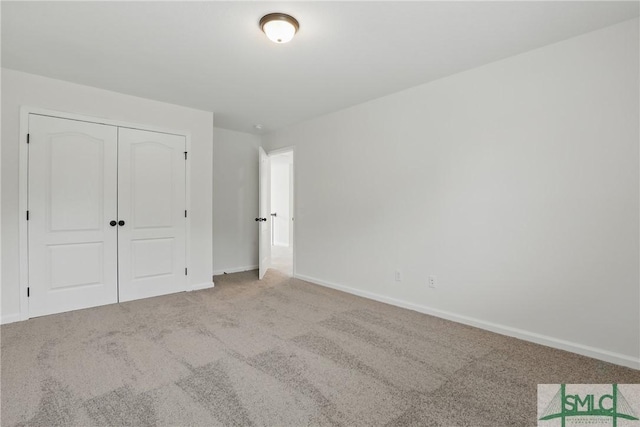 106 Liam Ct, Guyton, GA 31312 - unfurnished bedroom with carpet floors, baseboards, and a closet