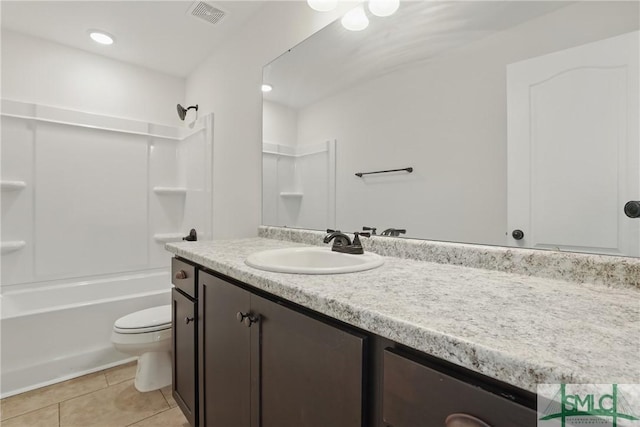 106 Liam Ct, Guyton, GA 31312 - bathroom featuring tile patterned flooring, toilet, vanity, and tub / shower combination