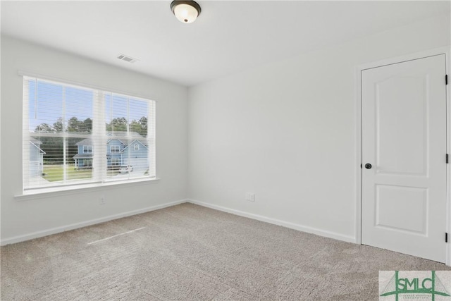 106 Liam Ct, Guyton, GA 31312 - spare room with carpet floors and baseboards