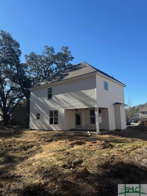 rear view of house with a patio