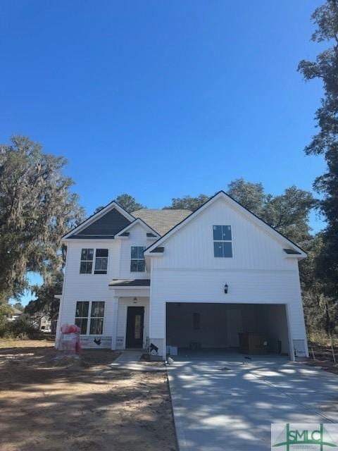 view of front of house featuring a garage and driveway