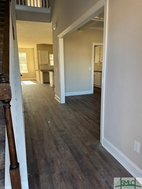 hall with dark hardwood / wood-style floors