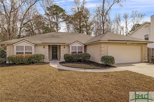 ranch-style house featuring a front lawn and a garage