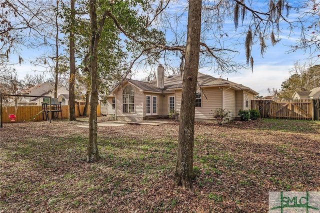 rear view of property with a patio