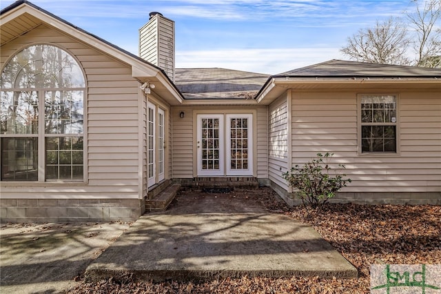 doorway to property with french doors and a patio