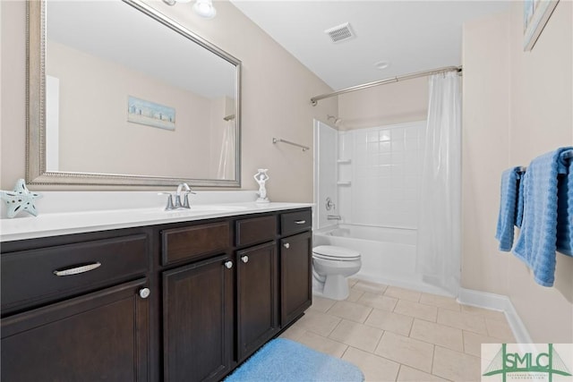 full bathroom with vanity, toilet, tile patterned flooring, and shower / tub combo