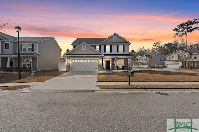 view of front of home featuring a garage and central AC