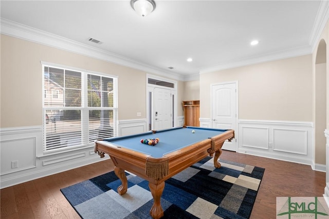 game room featuring billiards, ornamental molding, and dark hardwood / wood-style flooring