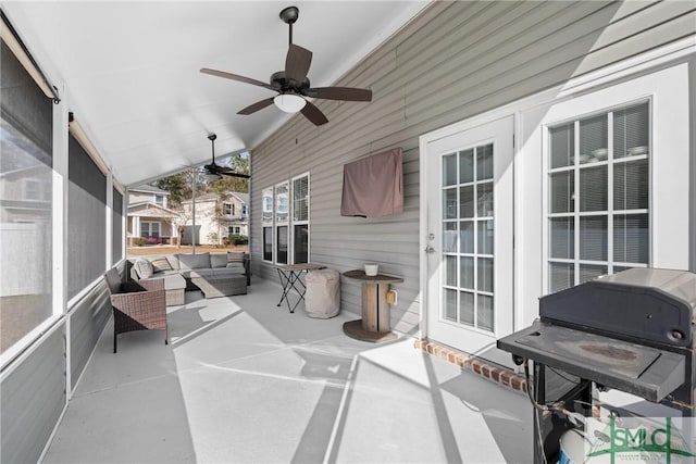 view of patio with an outdoor hangout area and ceiling fan