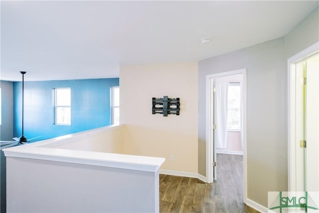 corridor featuring light hardwood / wood-style flooring