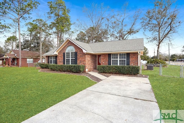 single story home featuring a front yard