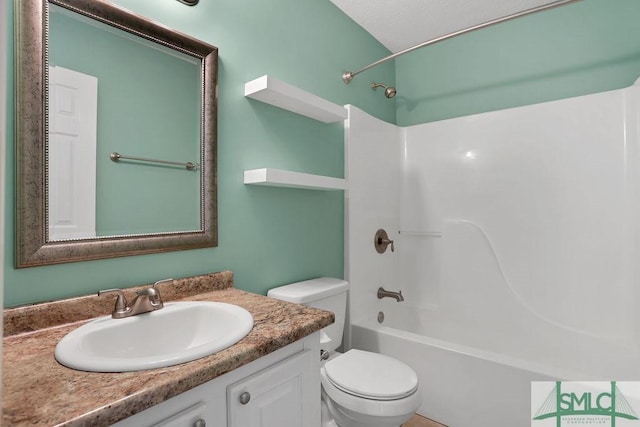 full bathroom with shower / bathtub combination, toilet, and vanity