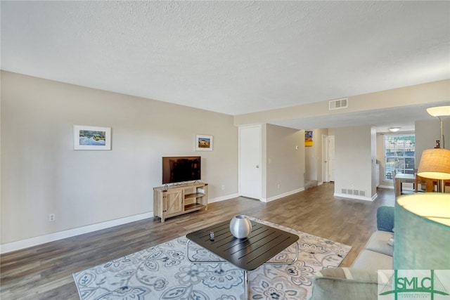 living room with dark wood-type flooring