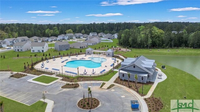 drone / aerial view featuring a water view