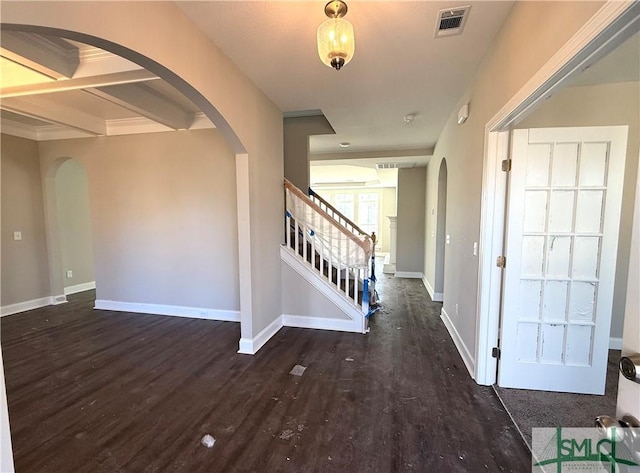 entrance foyer featuring dark wood-type flooring