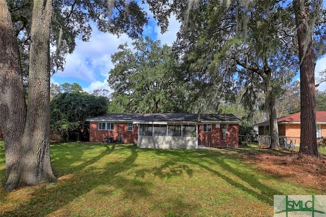 view of outdoor structure with a lawn