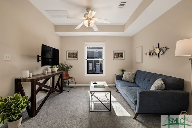 living room with ceiling fan and carpet flooring