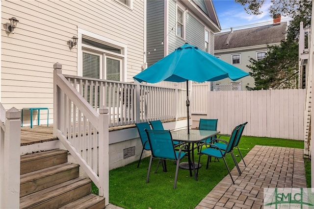 view of patio with a wooden deck