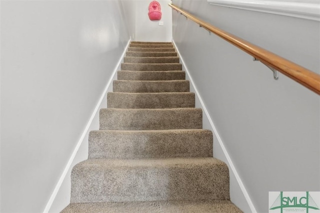 staircase with carpet