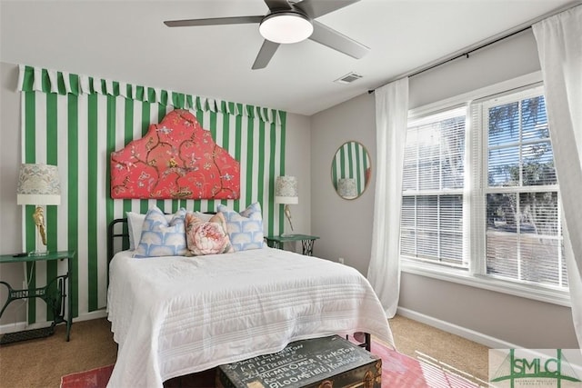 carpeted bedroom with ceiling fan