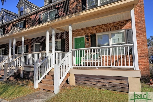 exterior space featuring covered porch