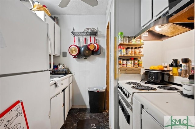 kitchen with ceiling fan, white appliances, white cabinetry, a textured ceiling, and ventilation hood