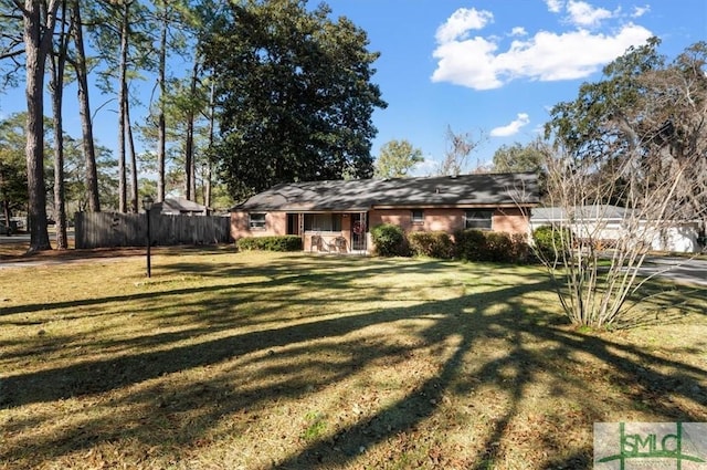 view of front of property with a front lawn