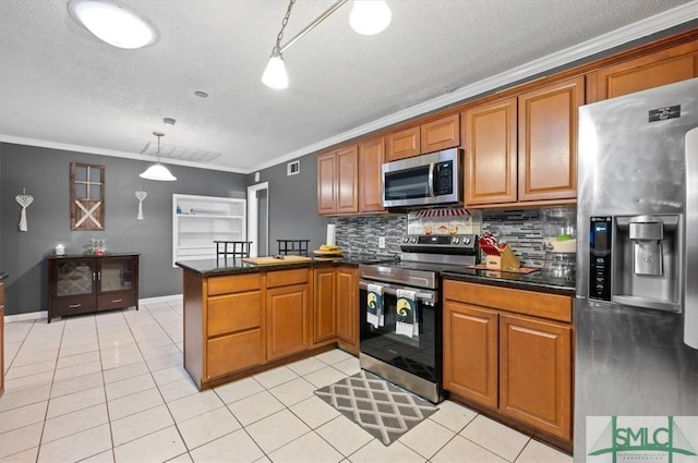 kitchen with kitchen peninsula, ornamental molding, stainless steel appliances, and pendant lighting