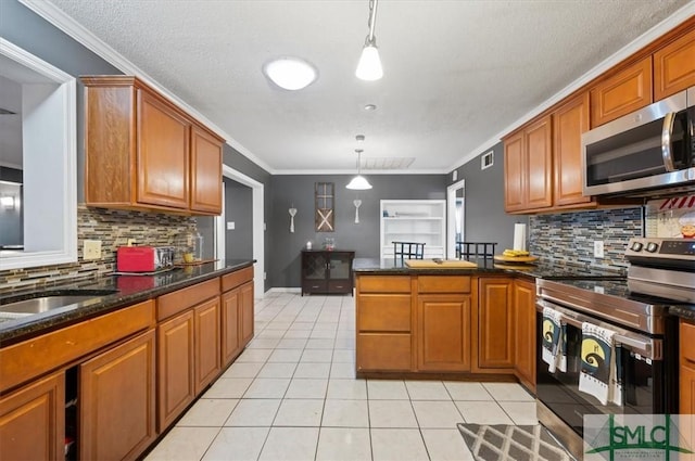 kitchen with stainless steel appliances, ornamental molding, tasteful backsplash, and hanging light fixtures