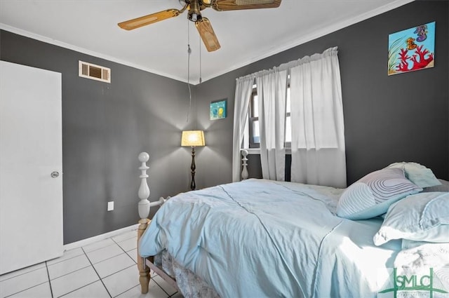 bedroom with ceiling fan, light tile patterned floors, and crown molding