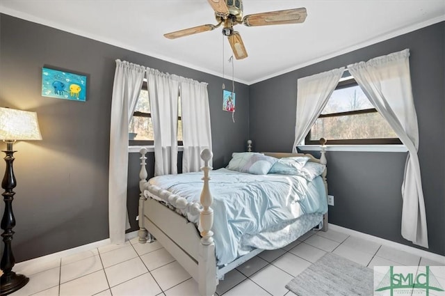 tiled bedroom featuring ceiling fan, crown molding, and multiple windows