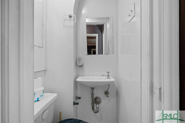 bathroom featuring toilet