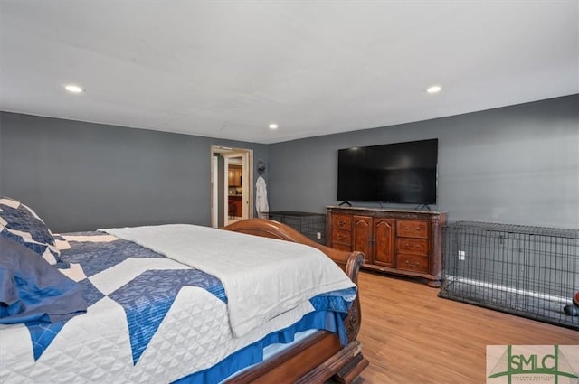 bedroom with light wood-type flooring