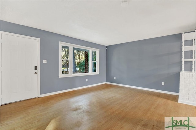 unfurnished living room featuring light hardwood / wood-style floors