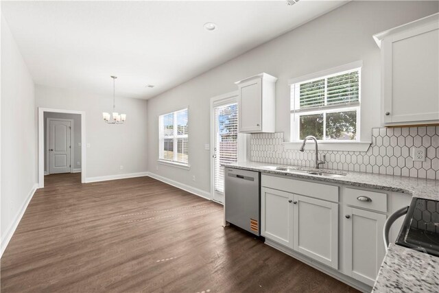 57 Oakmont Dr, Guyton, GA 31312 - kitchen with dishwasher, a sink, a chandelier, backsplash, and white cabinets