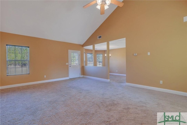 unfurnished room featuring high vaulted ceiling, ceiling fan, and light carpet