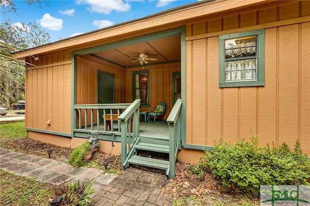 property entrance featuring ceiling fan and a porch