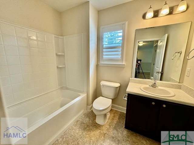 full bathroom with toilet, bathing tub / shower combination, and vanity