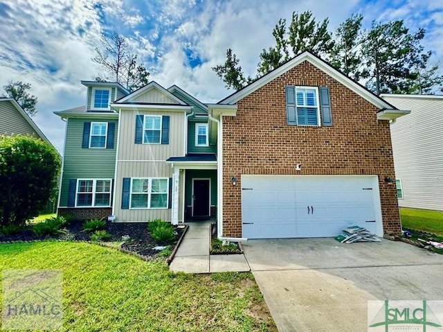 view of front of home featuring a front yard and a garage