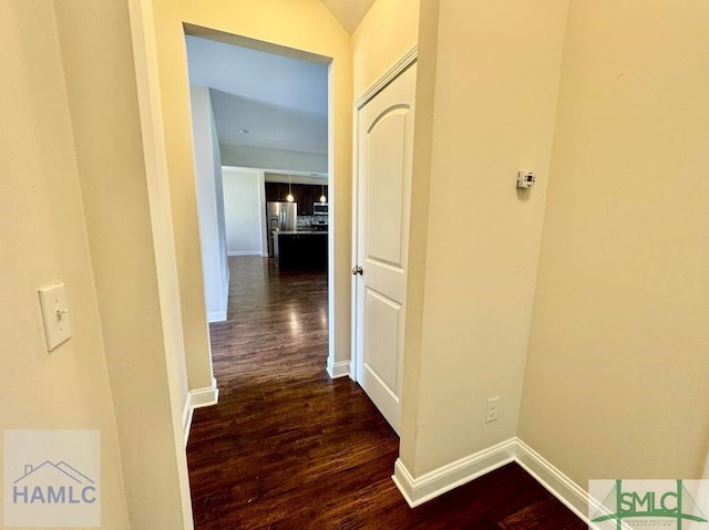 hall featuring dark wood-type flooring