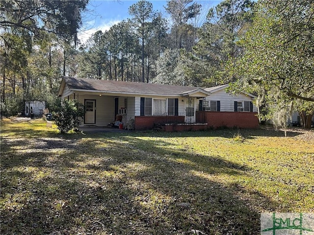 ranch-style house with a front lawn