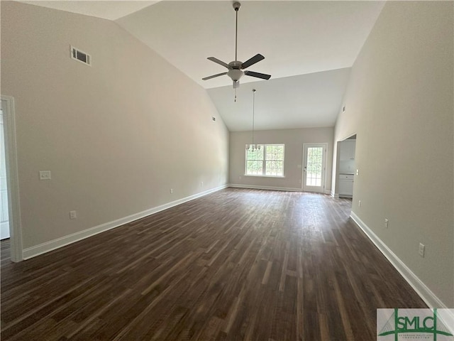 unfurnished living room featuring ceiling fan, dark hardwood / wood-style flooring, and high vaulted ceiling